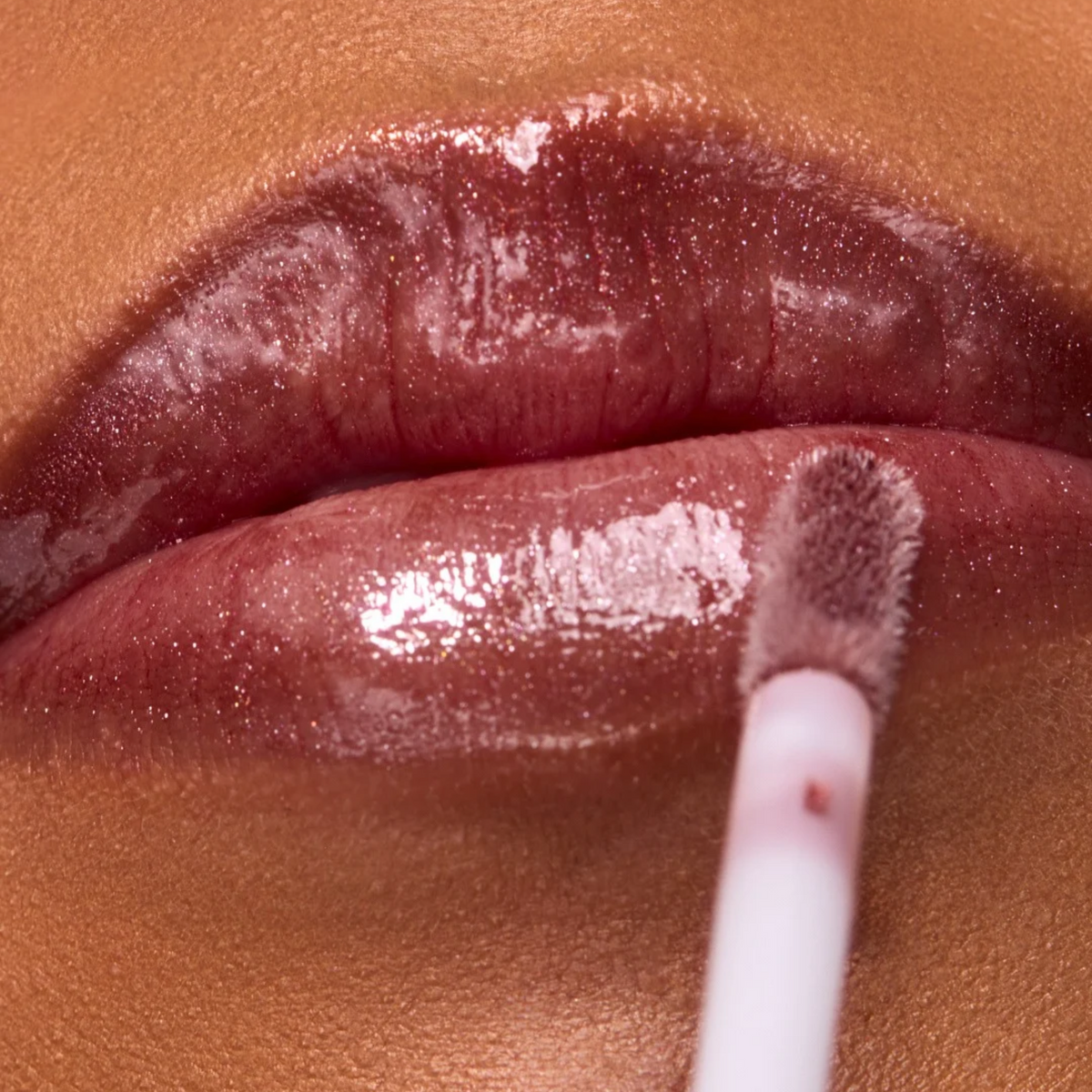 LIP GLOSS - SHIMMERING SHEER RAISIN - LG82